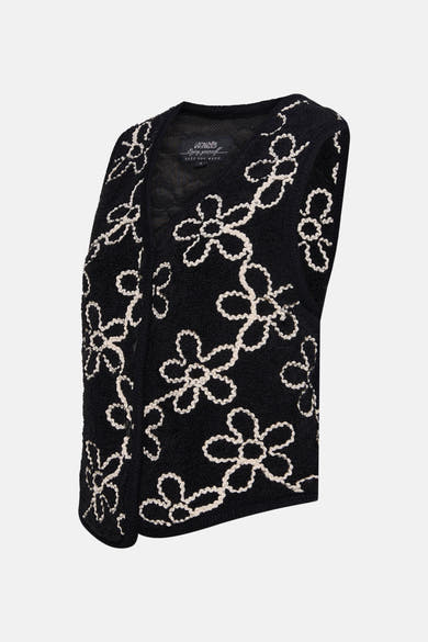 ZABAIONE zwart gilet met contrasterend geborduurd bloemenpatroon op een bouclé textuur.