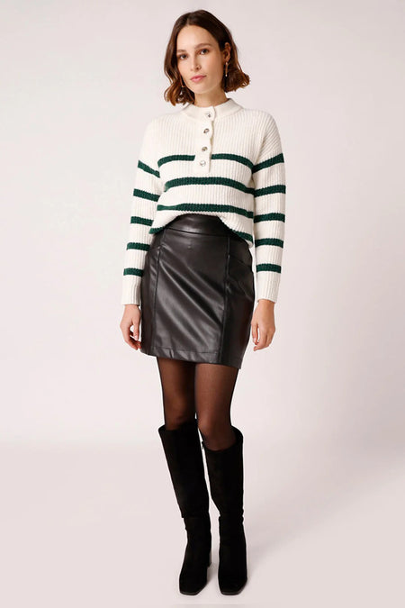 Black faux leather midi skirt with front seam detailing, worn with striped sweater and black boots in full-length lifestyle view