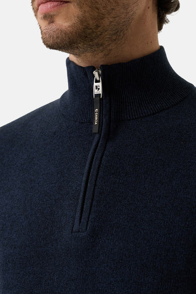 Navy blue ribbed knit half-zip turtleneck sweater by Garcia, featuring metallic zipper with branded pull tab, close-up front view