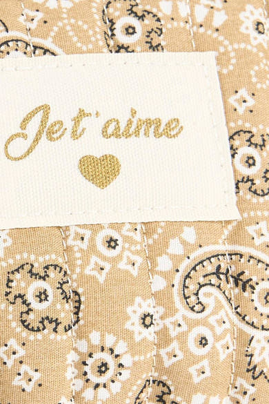 Trousse de toilette beige de Access® matelassée, motif bandana, avec étiquette crème brodée 'Jet t'aime' et un cœur doré.